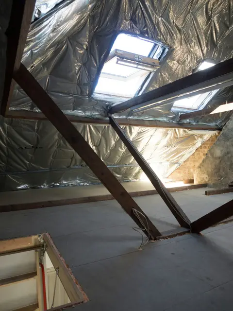 Attic with insulation and a skylight