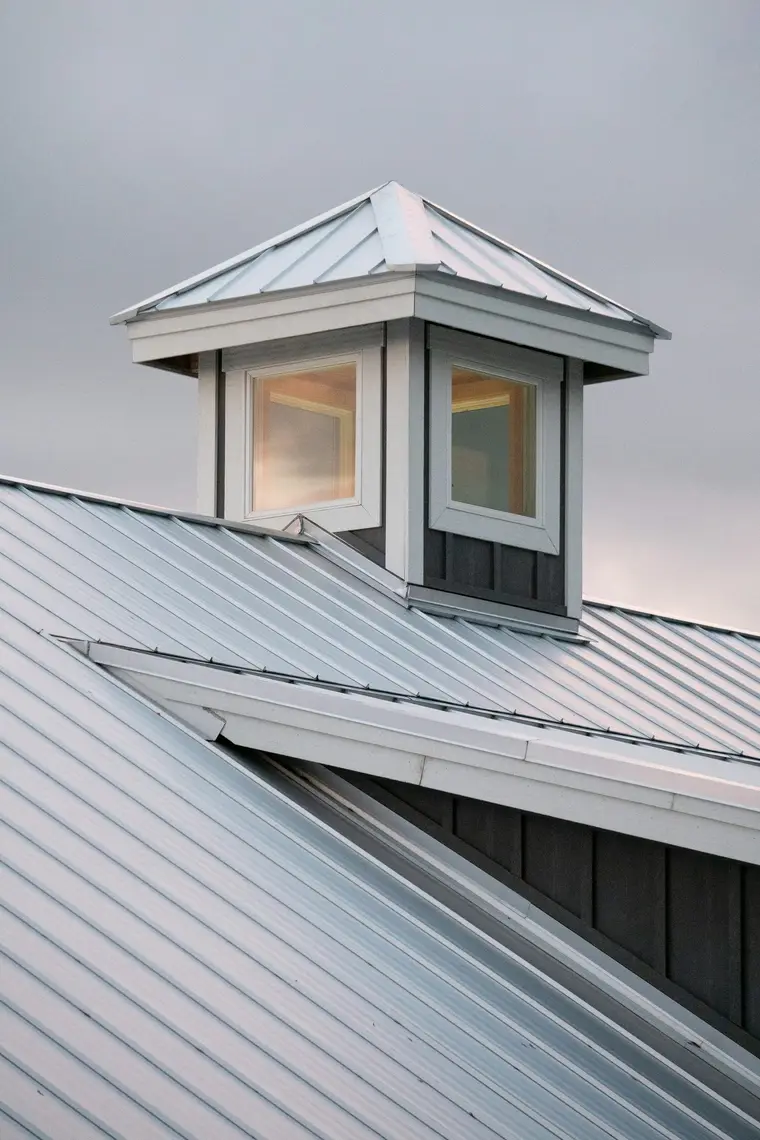Metal roof with a white cupola